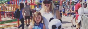 Bailey Heard with Ellie at 2017 State fair with stuffed toy