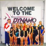 A picture of the kids with the coach at the Dynamo Olympics
